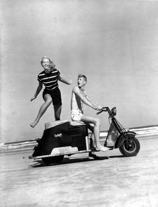 Local call number:  c006689
Title: [Betty Boone jumping over a motor scooter driven by Don Roberson]
Date: Photographed on November 11, 1948.
Physical descrip: 1 photoprint b&amp;w 5 x 4 in.
Series Title: (Commerce Collection.)
Repository: