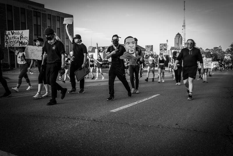Well over a thousand people marched up Grand Avenue in Des Moines before ending up on the front lawn of Terrace Hill, the Governor's mansion (she didn't come outdoors). The event was one of countless held over the past week to protest the police