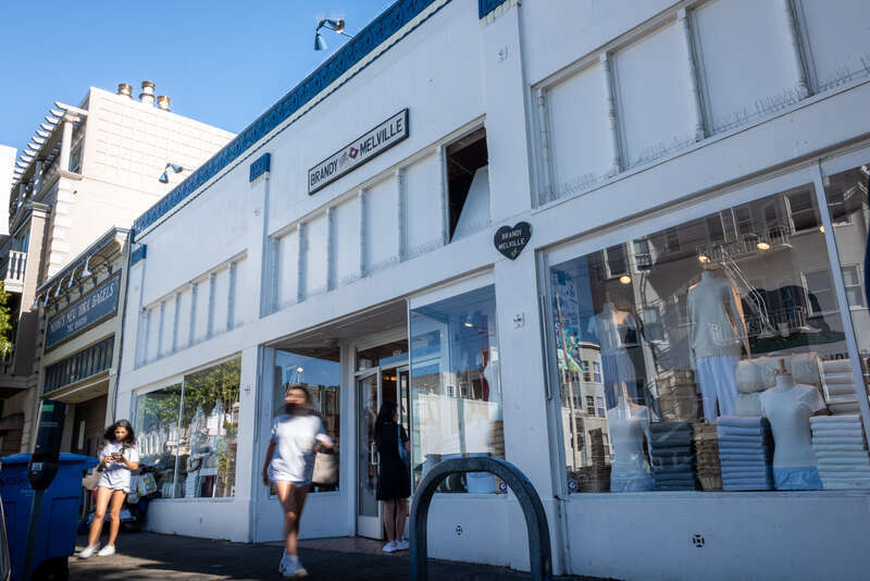 Patrons walk out of the Brandy Melville store on Chestnut St. in San Francisco.