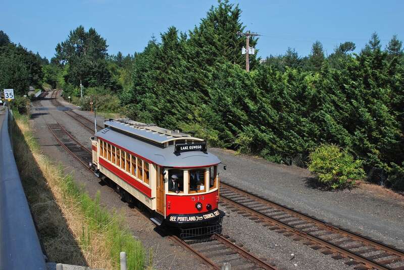 Willamette Shore Trolley car No. 514 approaching downtown Lake Oswego on August 16, 2014, the first day of service for this type of streetcar on the Willamette Shore line. Car 514 is a 1991-built replica of a Portland "Council Crest" car, a model of