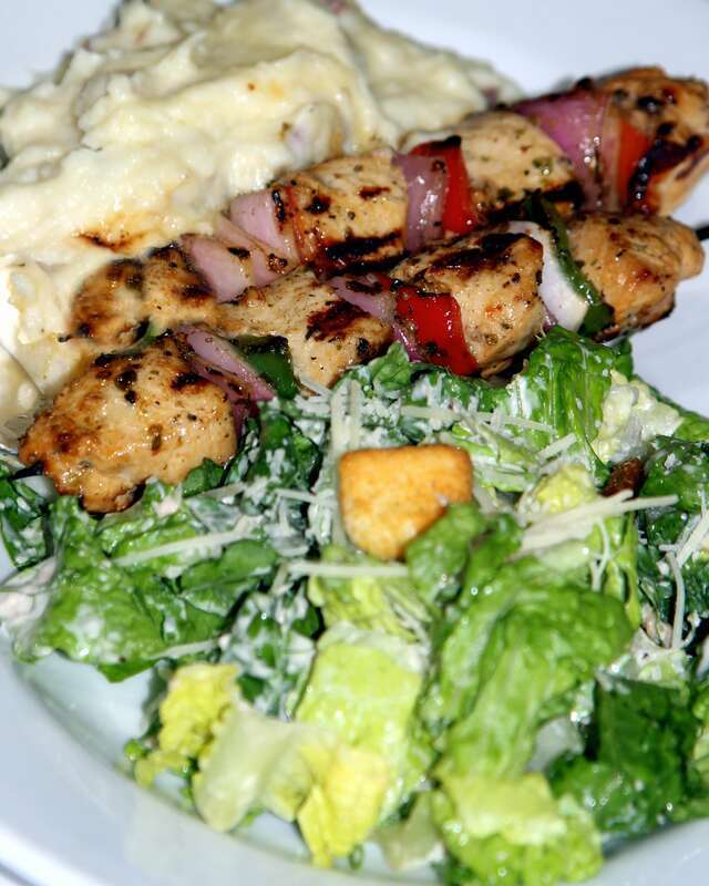 Marinated chicken pieces, skewered with bell peppers and red onion, served on our house garlic mashed potatoes and Classic Caesar salad
The LEMON LEAF Cafe
Historic Down Town Lancaster
653 W. Lancaster Boulevard
Lancaster, CA 93534
<a
