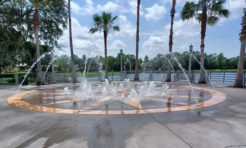 Fountain in Celebration, Florida, United States. Children can play in the fountain, and nearby there are two signs with a number of rules, including "Shower before entering" and "Do not use the fountain if you are ill with diarrhea". Location in the