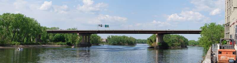 Looking upstream along the Hudson River at the Collar City Bridge in Troy, New York
