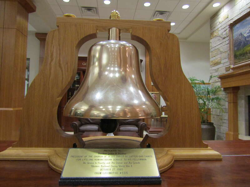 Bell presented to Gordon B. Hinckley "for lifelong humanitarian service to his fellowman, for service to Country and the Denver &amp; Rio Grande Western Railroad during World War II." Presented on October 27, 1995.