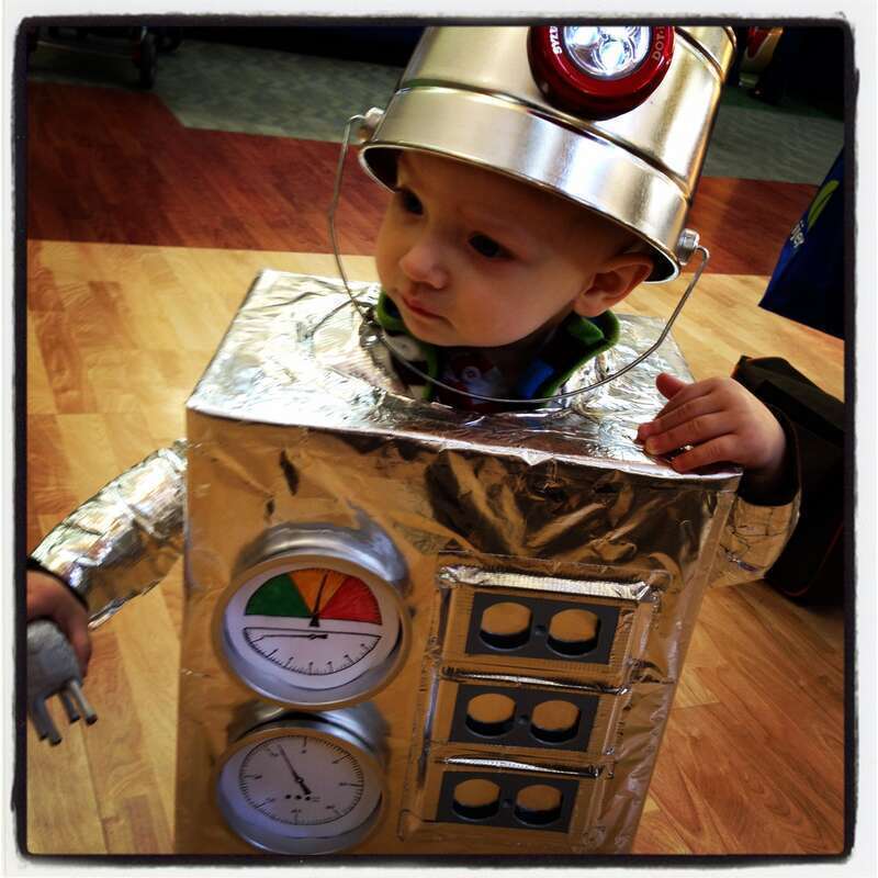 Little boy in a robot costume