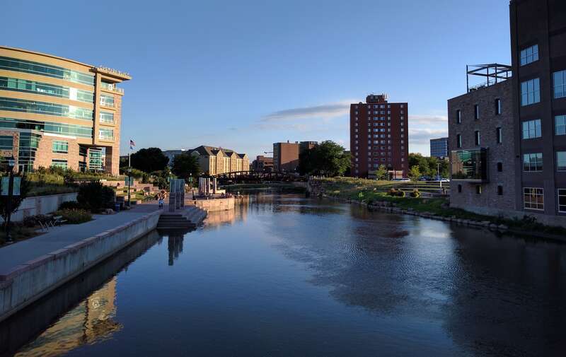 Downtown Sioux Falls, South Dakota, United States, from 6th St Bridge overlooking Big Sioux River.