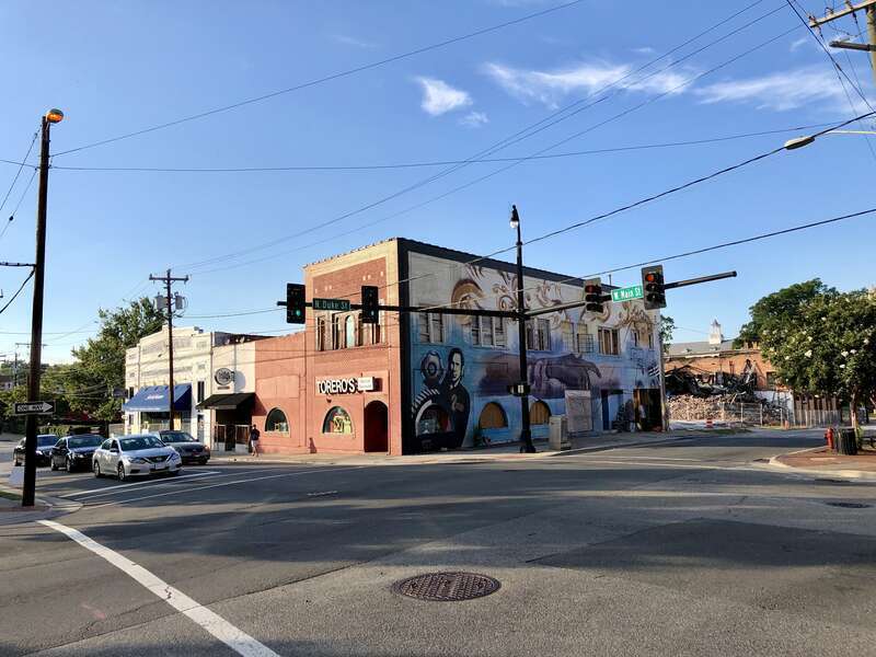 These buildings were damaged when a former Studebaker car dealership built in the early 20th Century on their block exploded in the spring of 2019.  Insurance payouts have yet to be decided, leaving the buildings vacant, businesses closed, and in a