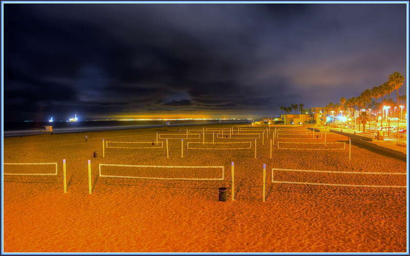 No volleyball after dark. Lights of Long Beach in the distance.

Three image blended HDR.