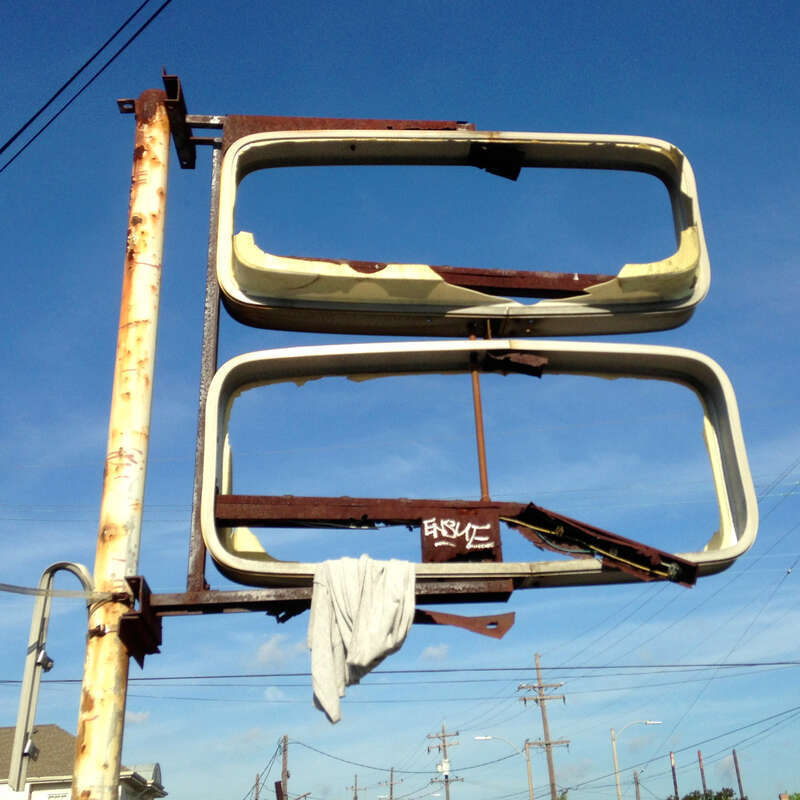 Broken sign and graffiti, Faubourg Marigny, New Orleans