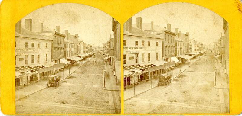 SV-062 — Nelson Dionne Collection. View looking east at Essex Street from Washington Street at Town House Square.

Published by Guy &amp; Bros., 163 Essex Street, Salem, Mass., and by photographers Cook &amp; Friend, c. 1870.