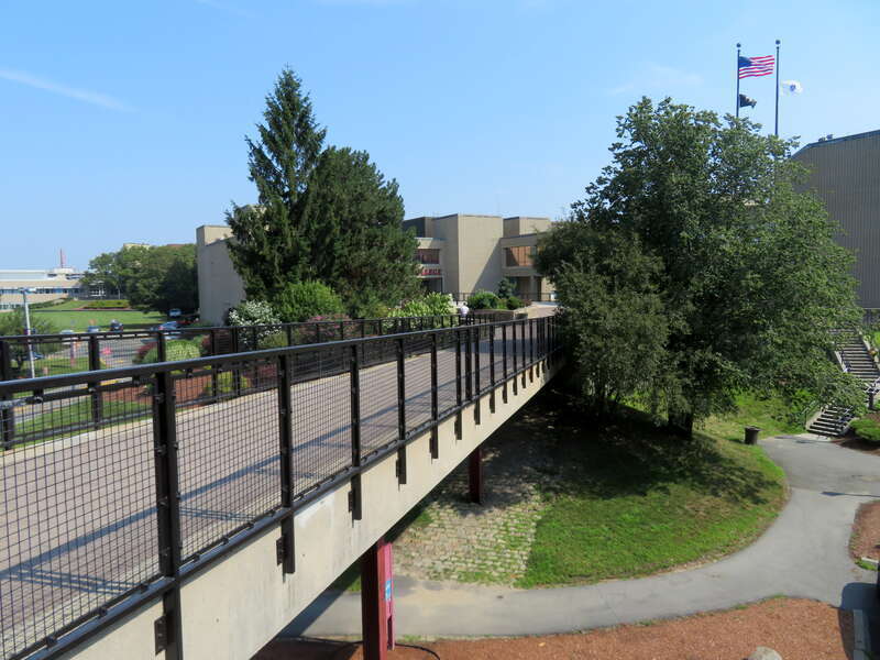 Footbridge to Bunker Hill Community College from Community College station in July 2019