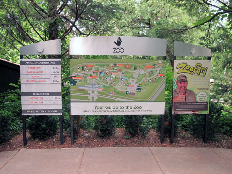 Photo of the front entrance board inside the Lincoln Children's Zoo, 1222 S. 27th Street in Lincoln, Nebraska.  The front entrance board gives information to visitors about daily zoo activities.  Photo is taken looking east-northeast, just inside