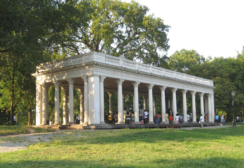 Looking northeast at the Grecian Shelter, or Croquet Shelter peristyle — late on a sunny summer afternoon.  
NYCLPC landmark designation 1968.
"Need an earlier-day shot for brighter light."