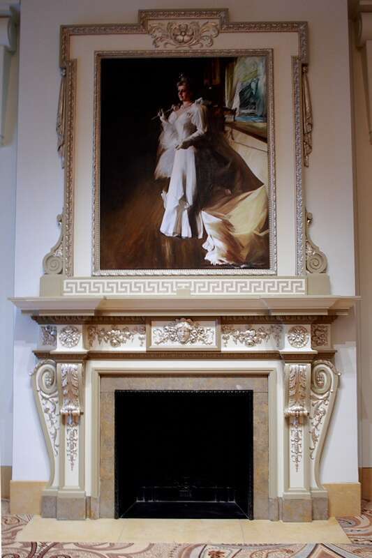 a center view of the fireplace in the Honoré Room