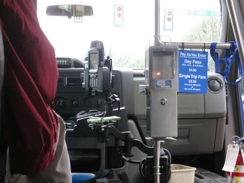King County Metro's DART (Dial A Ride Transportation) service is contracted out to Hopelink.  DART vans operate on a fixed schedule route but may deviate slightly from the route to pick up and/or drop off passengers.  Here's what you'd see inside one