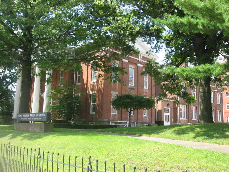 Front and northern side of the Judge William Rayen Building (originally the Rayen School), located at 222 Wick Avenue in Youngstown, Ohio, United States.  Built in 1866, it is listed on the National Register of Historic Places.
