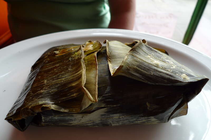 A fine tamale, wrapped in the banana leaf to start, at La Oaxaqueña, Mission Street.