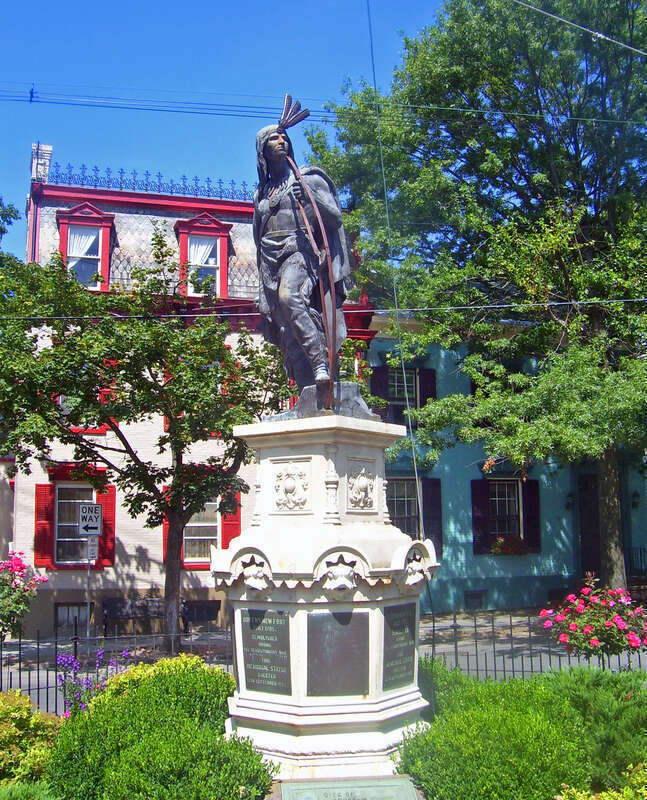 Statue of Lawrence the Indian, savior of Schenectady, NY, USA, at the center of the city's Stockade Historic District.