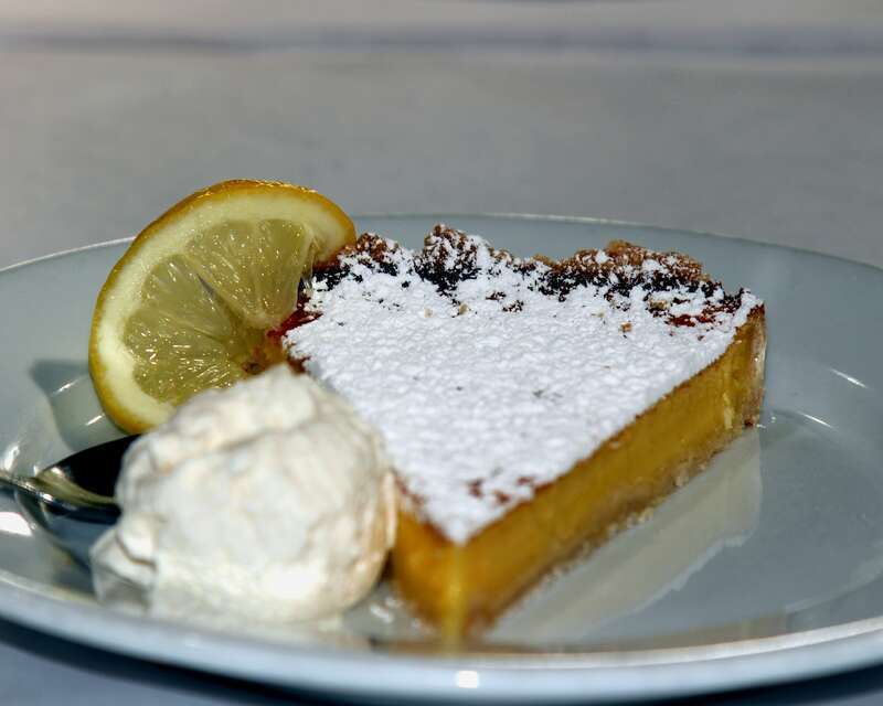 Tangy lemon custard baked in our signature shortbread crust
The LEMON LEAF Cafe
Historic Down Town Lancaster
653 W. Lancaster Boulevard
Lancaster, CA 93534
<a href="http://www.lemonleaf.com" rel="nofollow">www.lemonleaf.com</a>
Dessert