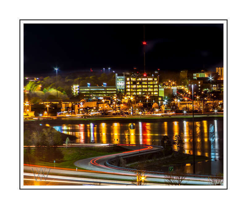 Portland, Maine at night with light trails from traffic along the Back Basin.