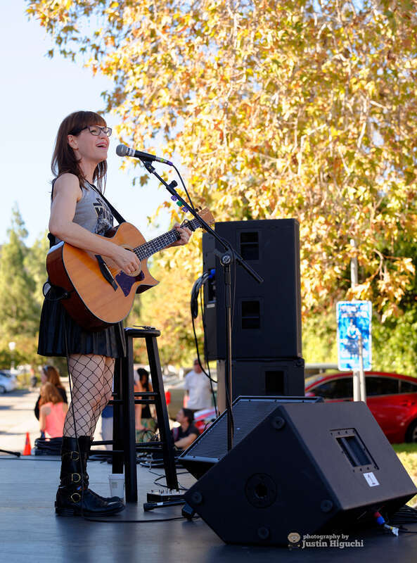 Lisa Loeb performing at "Spokes In The Oaks" in Thousand Oaks California on Saturday October 31st, 2015. This was the city's inaugural Open Street Festival. Brooke White opened for Lisa.