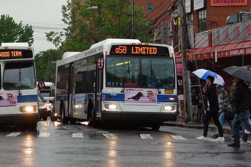 A Ridgewood Terminal-bound Q58 Limited bus entering service at the route's terminus at Main Street and 41st Road in Downtown Flushing, Queens.
