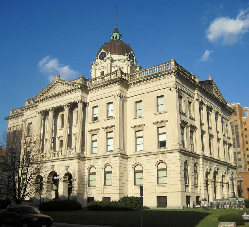 The McLean County Courthouse &amp; Square in Bloomington (1903). It was the home of the McLean County Circuit Court from 1900 to 1976. A fire damaged the building three years later, and it was redesigned by three of Bloomington's most notable