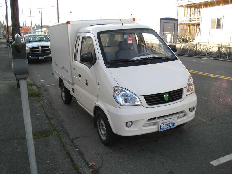 On the street in Olympia, Washington.  Low speed electrics are encouraged in Washington state. Miles ZX40ST electric truck is based on the first generation Hafei Minyi