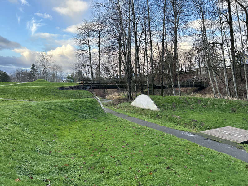 Split Ring at the Mill Creek Canyon Earthworks, a public park in Kent, Washington.