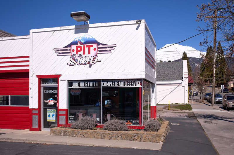 The Pit Stop auto service is seen in Mount Shasta, Califonia, on March 15, 2024. In the background the volcano Mount Shasta