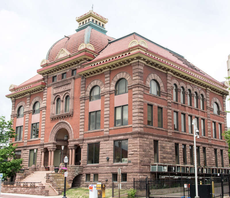 In 1894 the city of Marquette, Michigan constructed this building as its city hall. The city used the building until 1975, and then sold it to a developer who converted it into professional offices. This is listed in the National Register of Historic