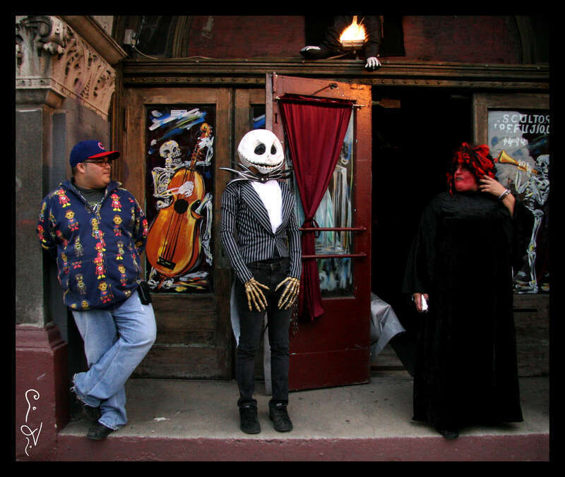The costume in the middle was one of the best ones I saw and there were many tonight.  Makes me think of Beetle Juice