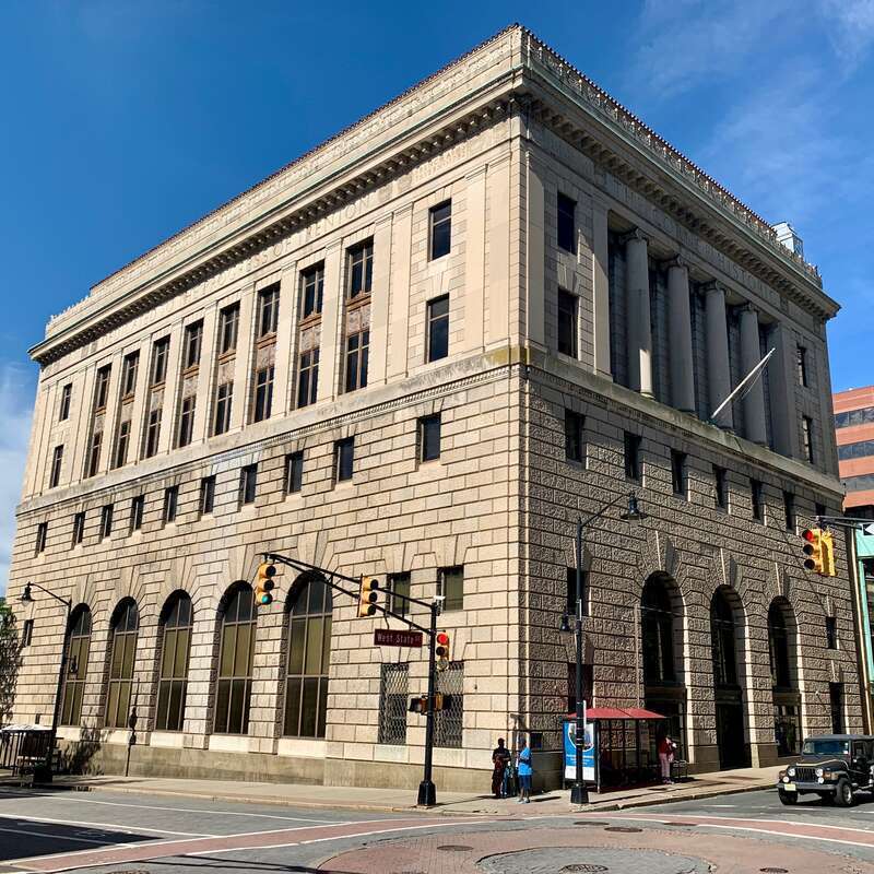 One West State Street, also known as the First Mechanics National Bank Building, on the site of the former City Tavern, in Trenton, New Jersey. This building had been used by Wells Fargo as a branch bank until 2013. The City Tavern hosted a dinner