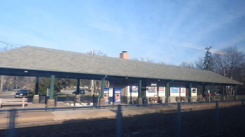 Looking northwest from a northbound train on a sunny morning.