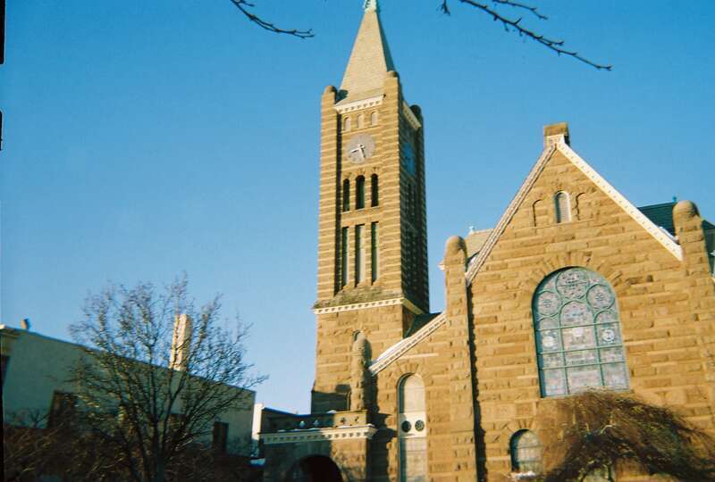 The clock tower of the historic Congregational Church of Patchogue on East Main Street in Patchogue, New York. I was told by a member of that church that the clock doesn't always have the right time. I was also told that I could use an image from the