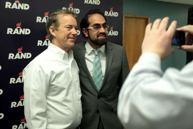 U.S. Senator Rand Paul speaking with a supporter at a campaign office visit at his Iowa campaign headquarters in Des Moines, Iowa.

Please attribute to Gage Skidmore if used elsewhere.