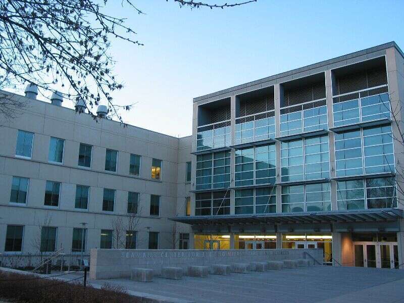 A photo of the John Deere Plaza, front of the building, and main entrance of the Seamans Center for the Engineering Arts and Sciences at the University of Iowa, on the corner of West Washington Street and South Capitol Street in Iowa City, Iowa.