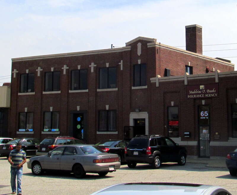 A side building - possibly a freight house - at the former Lawrence station in August 2012