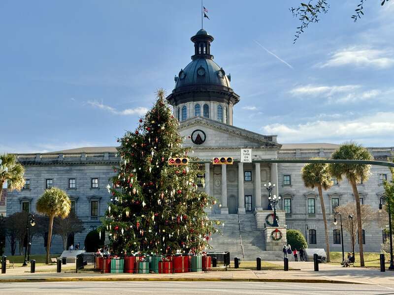 Built in 1851-1907, this Classical Revival-style building was designed by P. H. Hammarskold, John Niernsee, Frank McHenry Niernsee, Frank Pierce Milburn, and Charles Coker Wilson to serve as the state capitol building for South Carolina.  The
