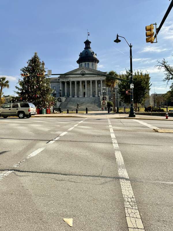 Built in 1851-1907, this Classical Revival-style building was designed by P. H. Hammarskold, John Niernsee, Frank McHenry Niernsee, Frank Pierce Milburn, and Charles Coker Wilson to serve as the state capitol building for South Carolina.  The