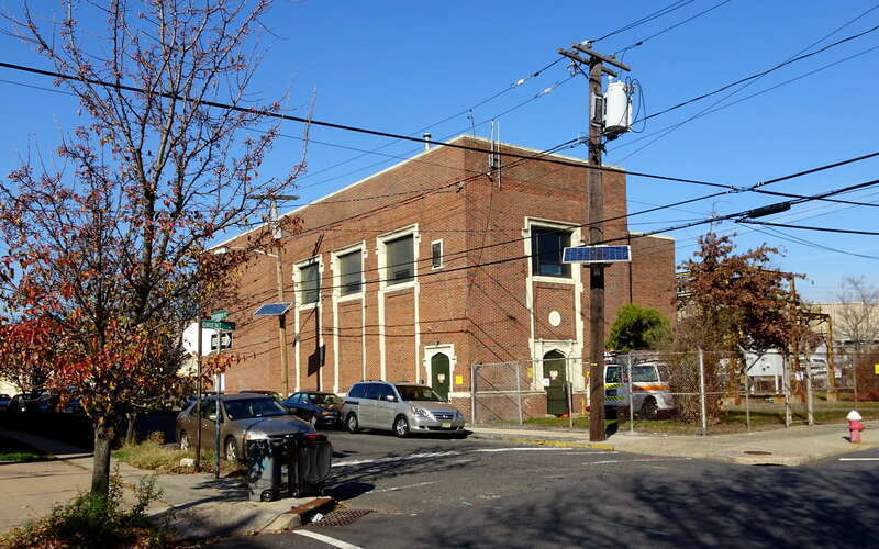 Looking north across Orient&amp;Evergreen at substation on a sunny late morning