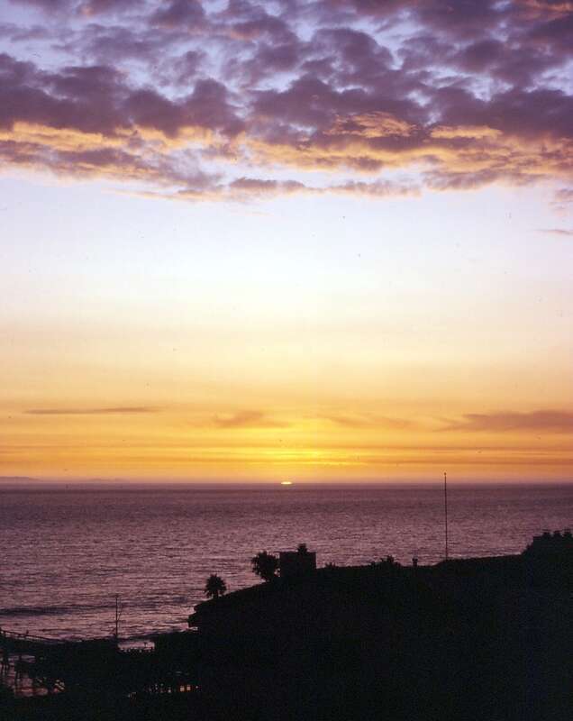 (1 in a multiple picture set)
For several years we would spend the last week of summer in an apartment just above the beach in San Clemente.  After supper each evening we'd walk the along the shore.  One evening the sun was setting just as we got