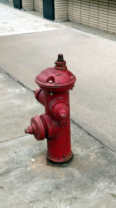 Old fire hydrant built by Rensselaer Valve Co. in downtown Jonesboro. The top says "The Corey"