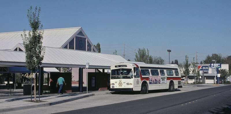 TriMet's Tigard Transit Center in 1988, about eight months after its opening (on January 10 of that year).  Bus 425, a 1972 Flxible "New Look" bus, is bound for Lake Oswego TC on line 78.  In the background is a sign for Greyhound Lines, which had a