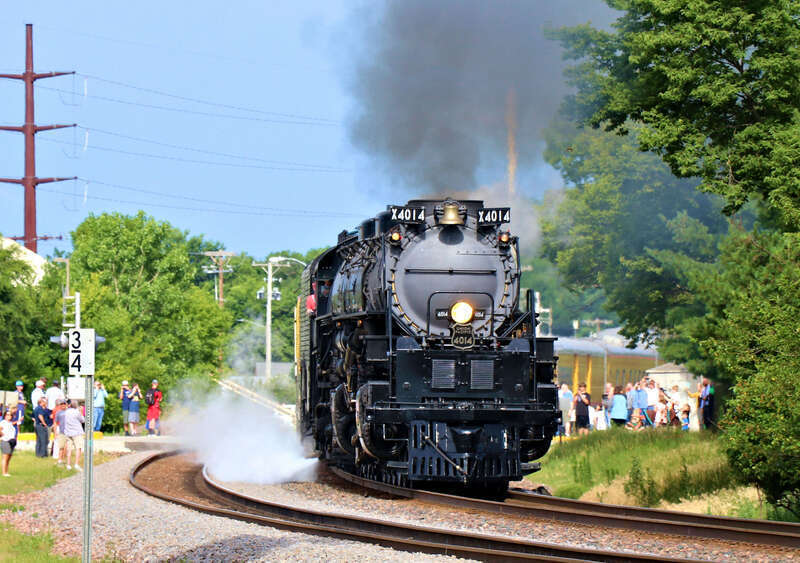 Union Pacific 4014 "Big Boy" (Alco 4-8-8-4) is Eastbound on the UP Clinton Sub seen here at the Kellogg Avenue Crossing North of Gilchrist Street in Ames, Iowa.
Car/Power List:
4014 - Alco 4-8-8-4
814 - Joe Jordan
809 - Jim Adams
3025 -