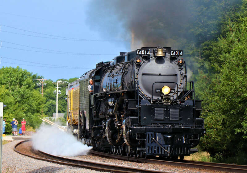 Union Pacific 4014 "Big Boy" (Alco 4-8-8-4) is Eastbound on the UP Clinton Sub seen here at the Kellogg Avenue Crossing North of Gilchrist Street in Ames, Iowa.
Car/Power List:
4014 - Alco 4-8-8-4
814 - Joe Jordan
809 - Jim Adams
3025 -