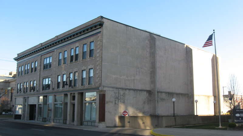 Front and western side of the W.W. Shirk Building, located at 219 E. Jackson Street (State Road 32) in Muncie, Indiana, United States.  Built in 1896, it is listed on the National Register of Historic Places.