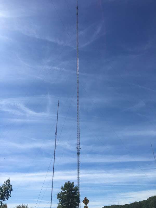 The shared transmitter for WOIO and WUAB (foreground) at the West Creek Reservation in Parma, Ohio. To the immediate left is a transmitter tower in use by: WMJI, WBNX-TV, WOCV-CD, WCDN-LD, WRAP-LD and W265BT. At far right is the transmitter for