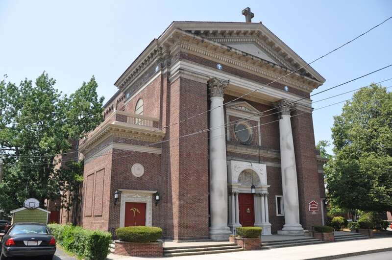 A photograph of the historic St. Charles Borromeo Church in Waltham, Massachusetts.