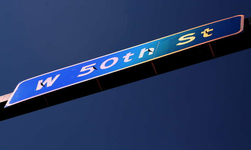 Street sign: "W 50th St" - Edina Art Fair 2006. 50th Street and France Avenue, borderline between Minneapolis and Edina, Minnesota.